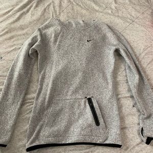 Grey turtleneck hoodie from Nike.